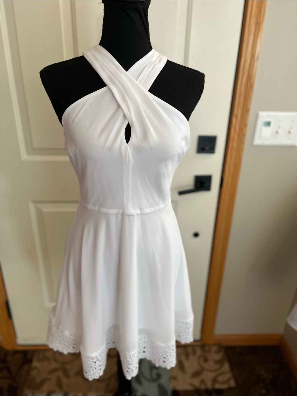 Express white criss cross halter fit flare mini dress with lace eyelet trim. 2